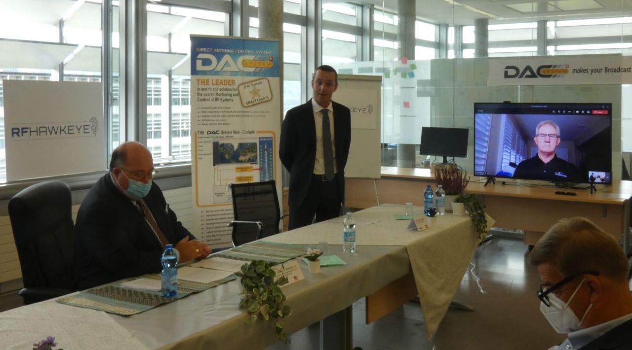 Press conference with Ambassador Edward McMullen (left) and DAC System CEO Pietro Casati. Press conference with Ambassador Edward McMullen (left) and DAC System CEO Pietro Casati.